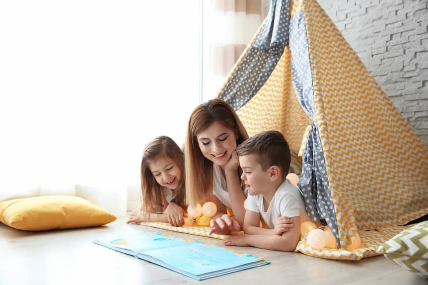 Nanny in tent with kids