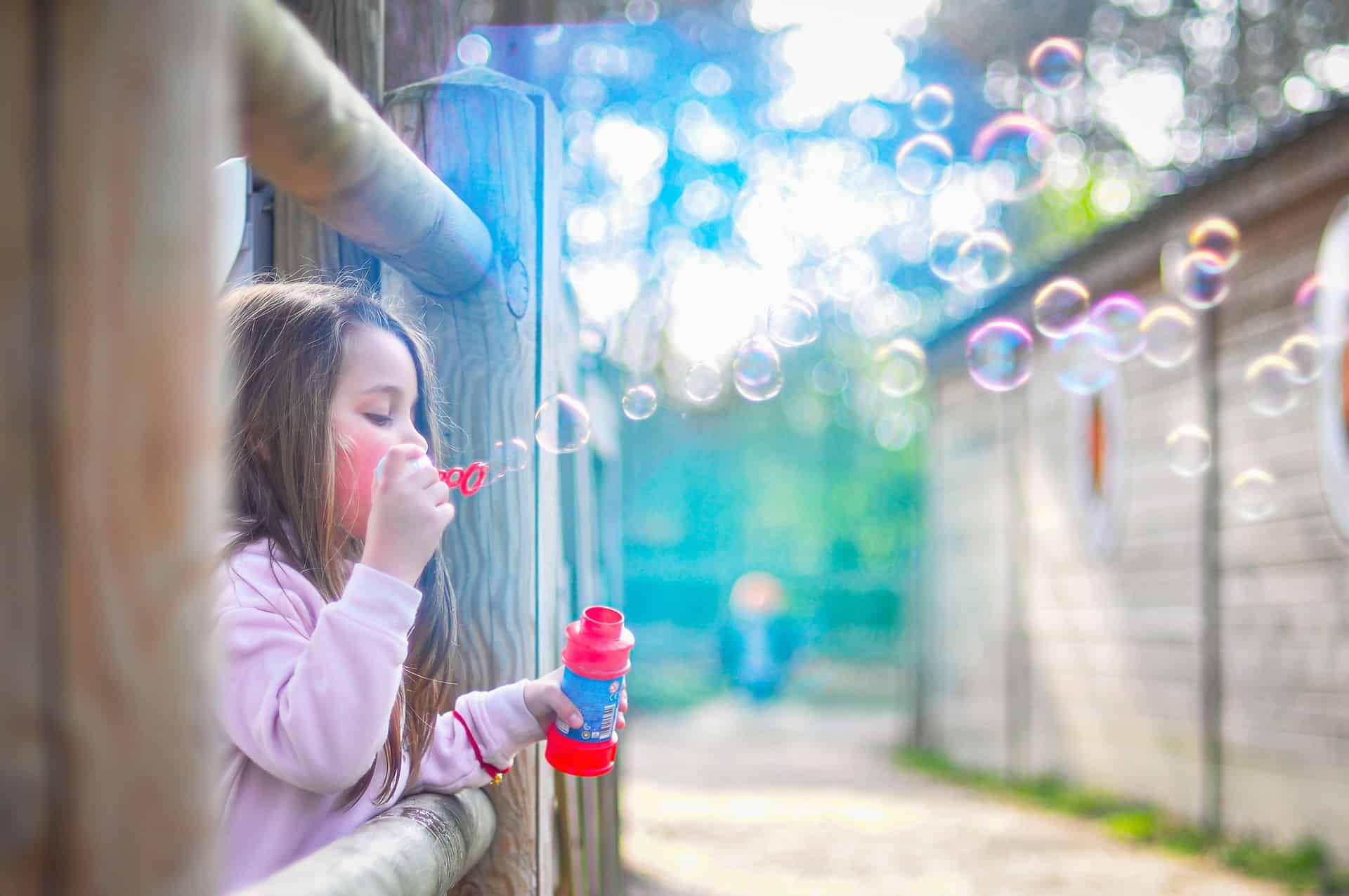 Girl blowing bubbles