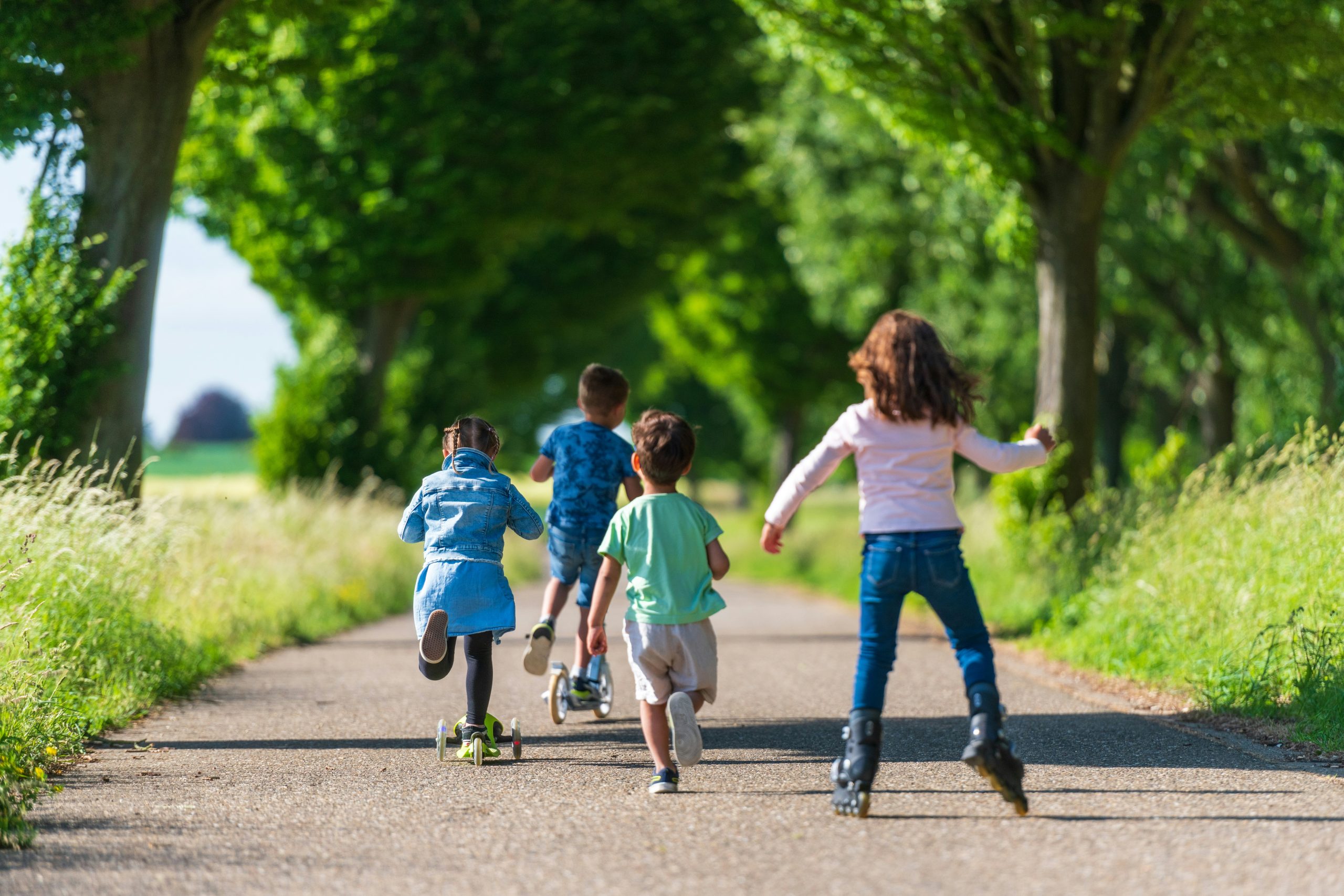Four Children Outside – Job Four children outside on a bike path together